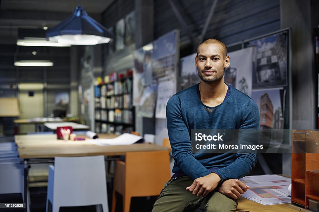 Portrait of architect Portrait of male architect at workstation in modern studio Portrait Stock Photo