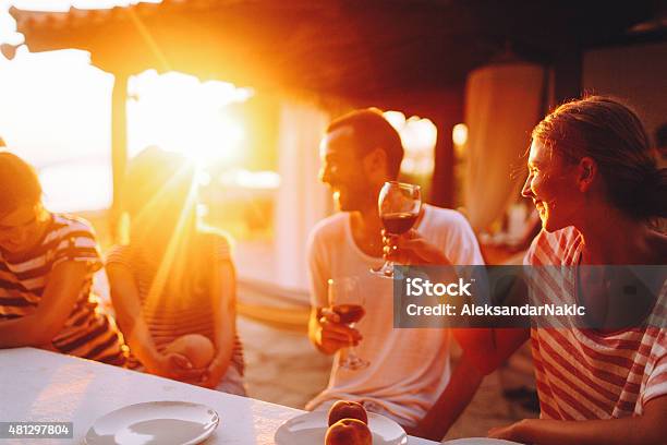 Heres To Our Friendship Stock Photo - Download Image Now - Celebratory Toast, Beach, Sunset