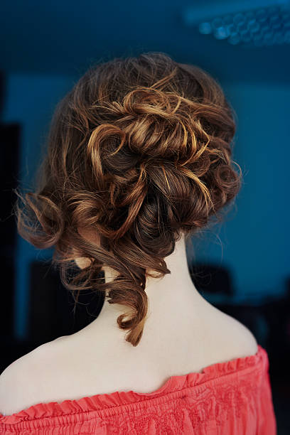 istock hairstyle with ringlet and hairbun 481298080