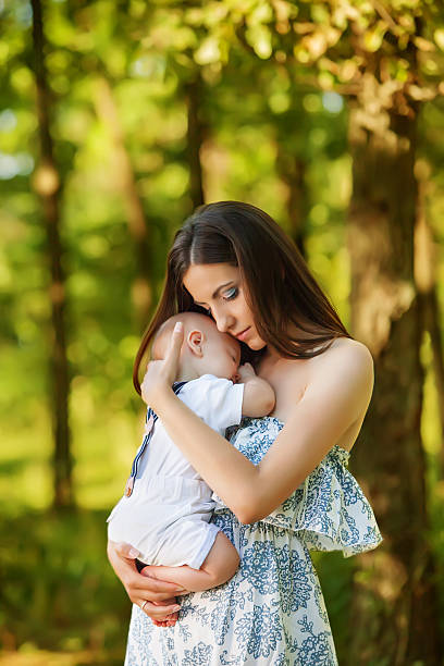 istock Mother with her child take rest in park 481299279