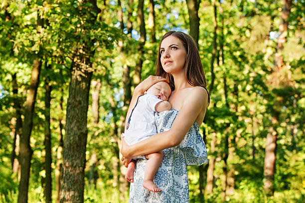 istock Mother with her child take rest in park 481299519
