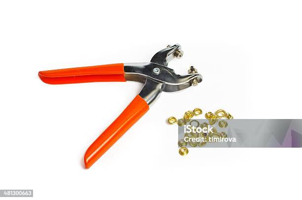 Hand Eyelet Tool And Metal Eyelets Stock Photo - Download Image Now - Art And Craft, Bonding, Chrome