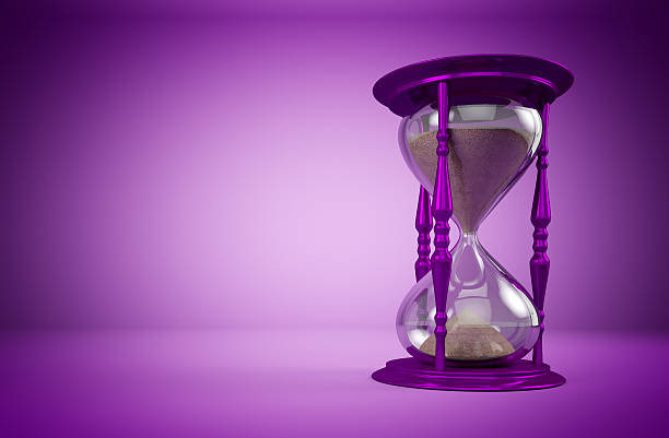istock Purple hourglass on purple background with a copyspace 481301228