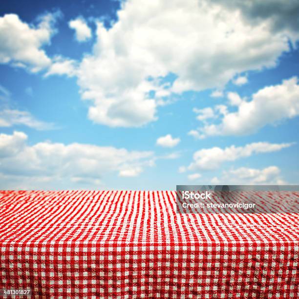 Empty Wooden Deck Table With Clouds In Background Stock Photo - Download Image Now - Picnic Table, Abstract, Backgrounds