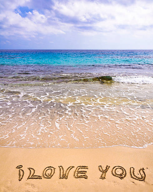 istock words I Love You written in sand 481305955