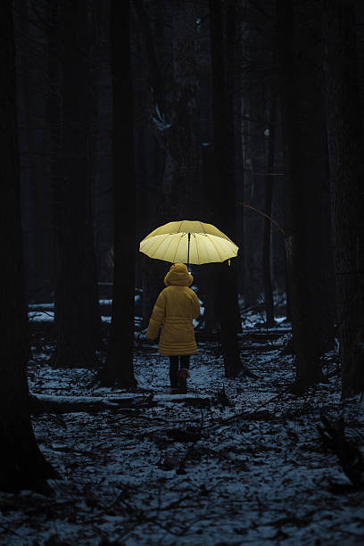 istock Little girl in the dark forest 481308074