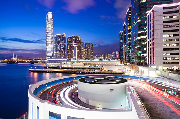 View of hotels, shopping mall and modern residential buildings in Hong Kong at night