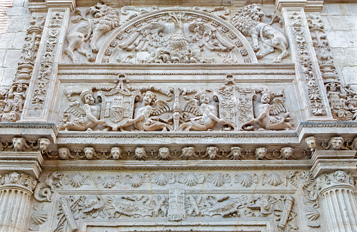 Granada, Spain   - May 31, 2015: The detail of renaissance portal of Casa de Castril by Sebastian de Alcantara from year 1539.