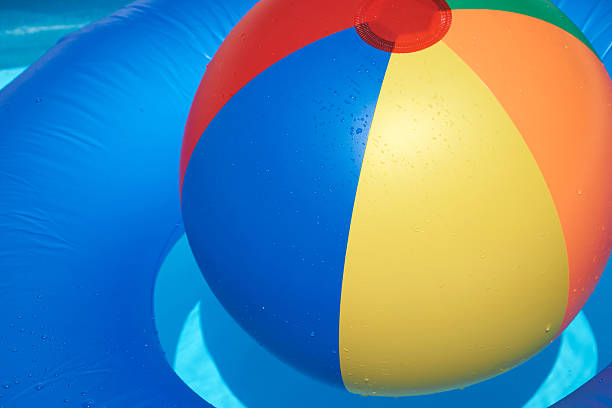 istock Floating tire and Beach Ball 481312940