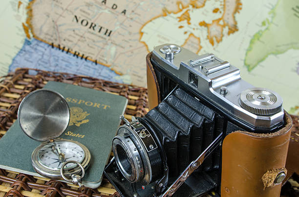 istock Antique Bellows Camera, Passport, and Map 481316135