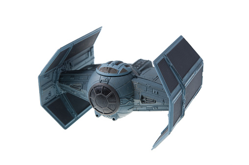 Adelaide, Australia - July 09, 2015: A studio shot of a diecast model of Darth Vader's TIE Advanced x1 starfighter from the Star Wars Movie. Merhcandise from the Star Wars universe are highly sought after collectables.