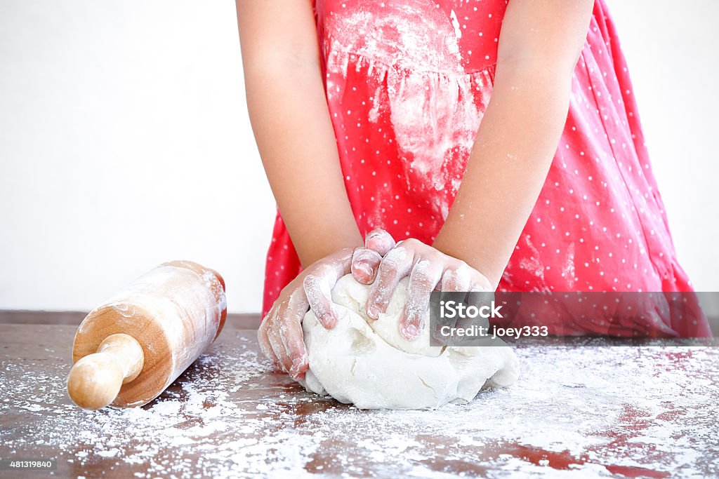 Little kid prepare pizza dough 2015 Stock Photo