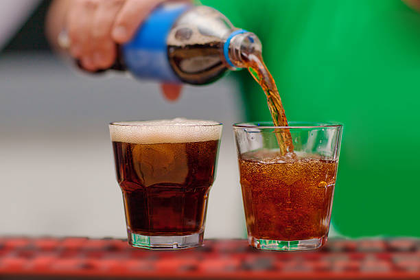 Carbonated drink poured into a glass stock photo