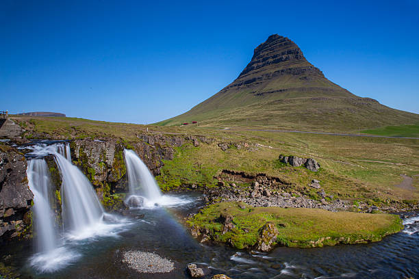 istock Kirkjufellsfoss waterfall and Kirkjufell mountain 481321512