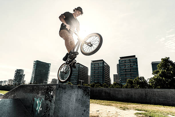 istock BMX rider jumping in urban environment 481321964