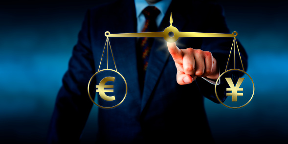 Torso of a trader reaching out to equate the Euro sign at par with the China Yuan symbol on a golden weight scale. Financial metaphor for the modern foreign exchange market. Illustration and photo.