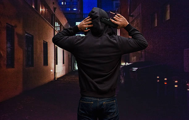 istock Rear view of man holding handgun 481328842