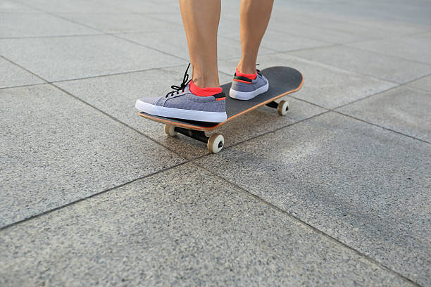 istock skateboarder skateboarding at  city 481329080