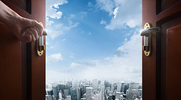 istock room with open door with city 481330530