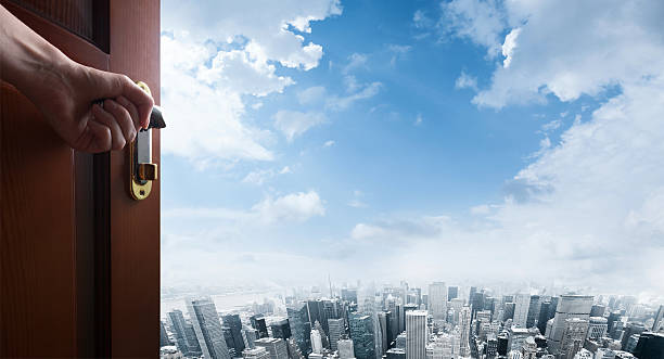 istock room with open door with city 481330550