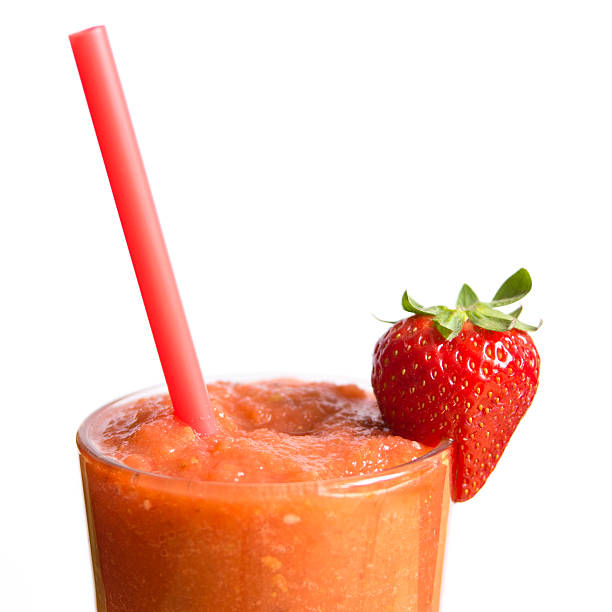 istock Strawberry smoothie in glass with straw, isolated 481333310