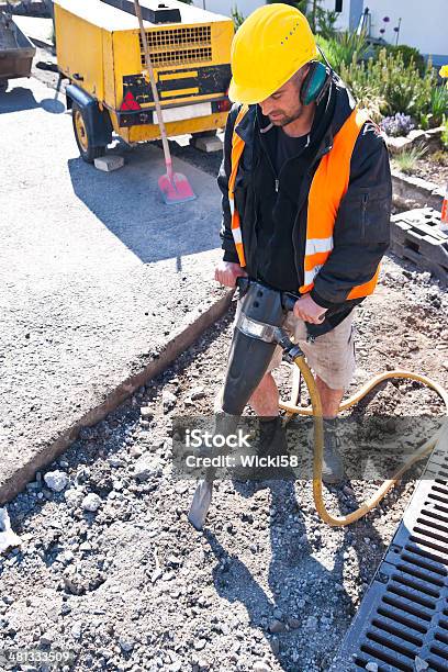 Road Worker With Jackhammer Stock Photo - Download Image Now - Jackhammer, Men, Construction Industry
