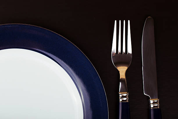 istock beautiful cutlery on a black matte background 481333714