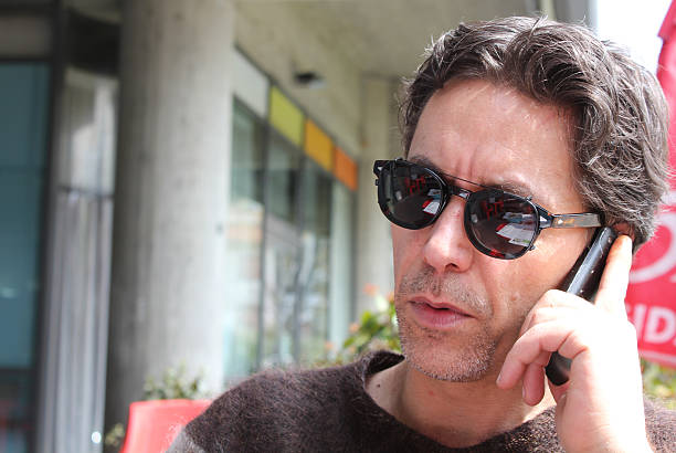 istock man talking on the phone 481334508