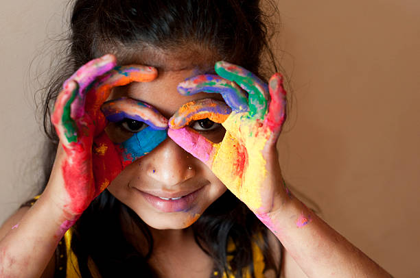istock Small girl playing with colors 481336133