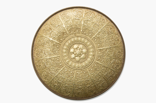 A highly-detailed gold shield