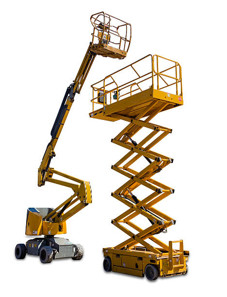 Scissor lift and articulated boom lift Two types of mobile aerial work platform - yellow scissor hydraulic lift and yellow hydraulic articulated boom lift on light background. Isolation. mobile crane stock pictures, royalty-free photos & images