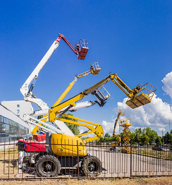 istock Several various self propelled articulated boom lift and scissor 481338046