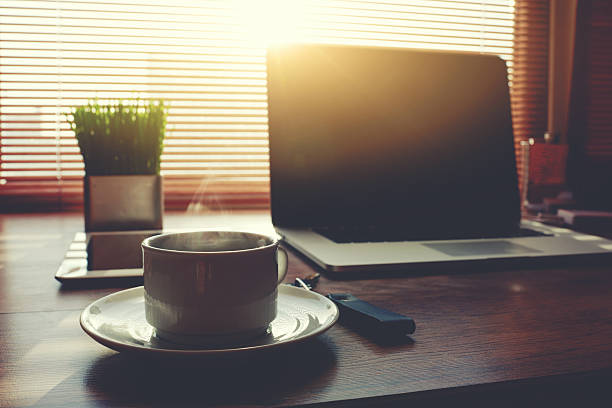 istock Home freelance desktop with open laptop computer, cup of coffee 481341132