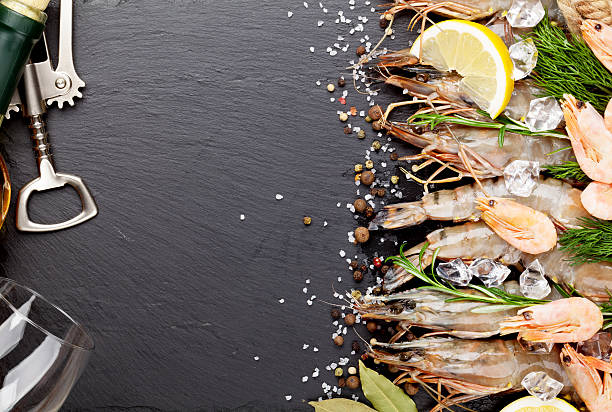 istock Fresh prawns with spices and white wine 481342274