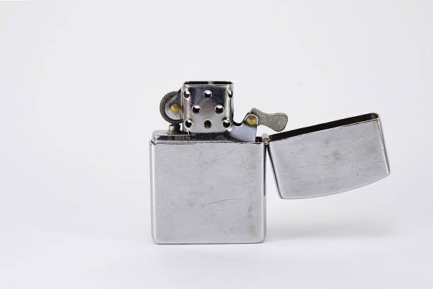 istock Silver metal lighter, zippo style lighter isolated on white background 481345852