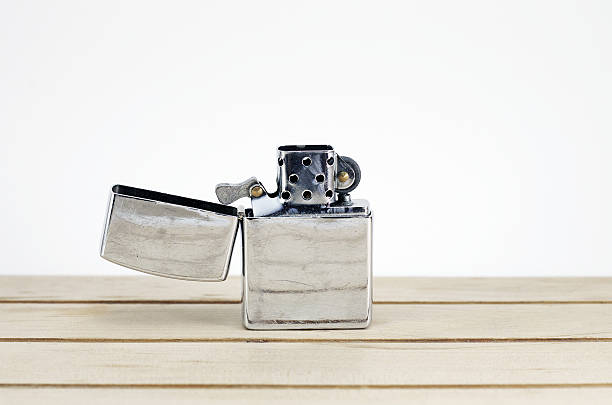 istock Silver metal lighter, zippo style lighter isolated on white background 481345888