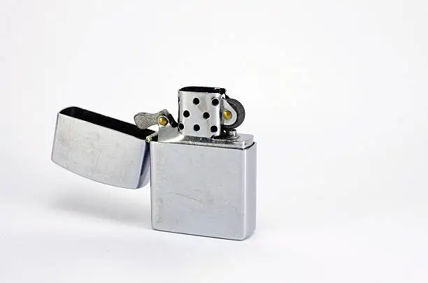 Silver metal lighter, zippo style lighter isolated on white background