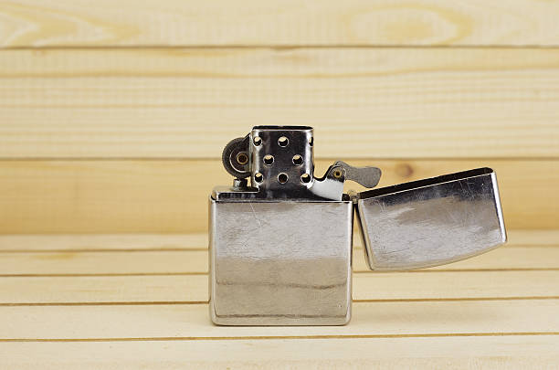 istock Silver metal lighter, zippo style lighter isolated on white background 481345952