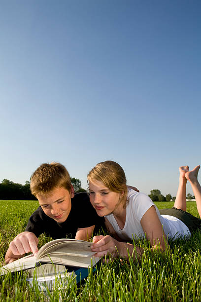 istock Brother and sister work together at their homework 481346795