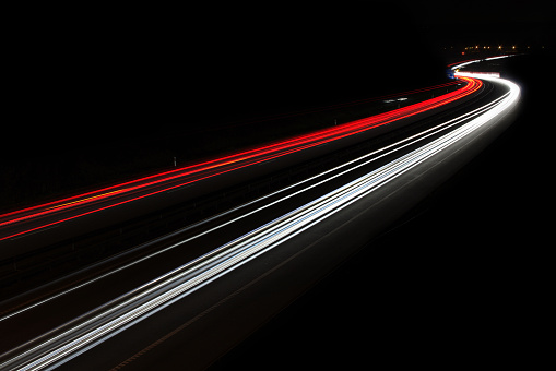 the car's light trails on the street long exposure