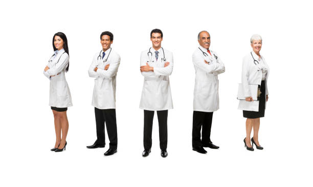 Smiling medical team isolated over white