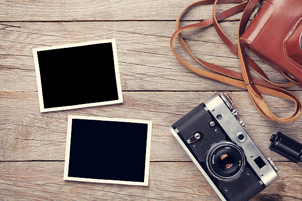 istock Vintage film camera and two blank photo frames 481354370