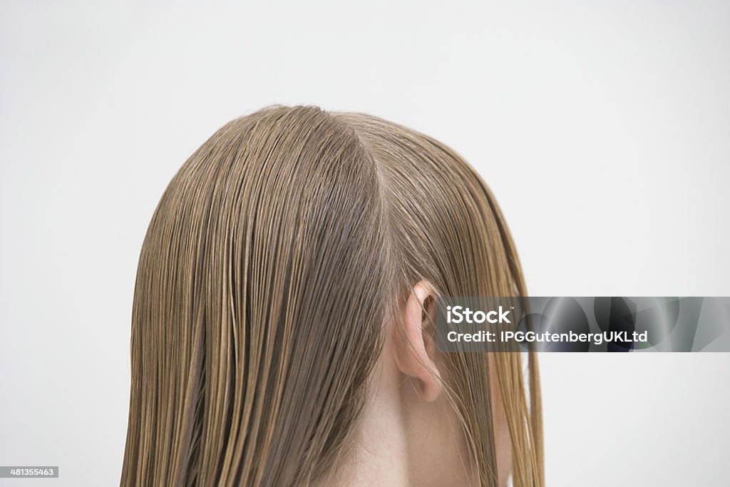 Customer With Parted Wet Hair Closeup of female customer with parted wet hair Adult Stock Photo