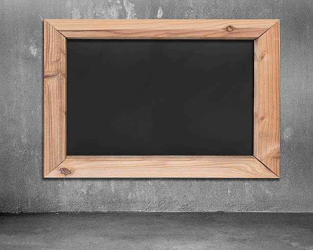 istock Blank blackboard with wooden frame hanging on concrete wall 481355500