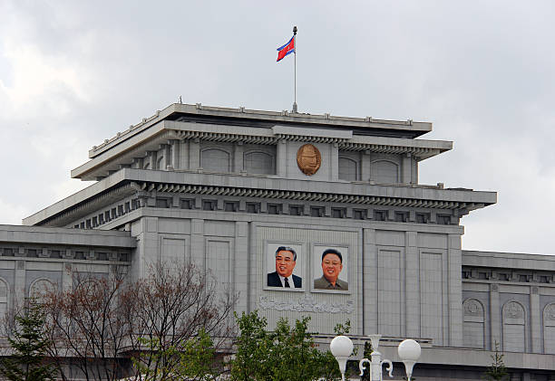 North Korea DPRK: Kumsusan Memorial Palace Of The Sun Pyongyang, North Korea - August 14, 2013: Kumsusan Memorial Palace Of The Sun (mausoleum of Kim Il Sung and Kim Jong Il). A palatial structure where the two leaders lay in state, and each has a museum dedicated to them. kim il sung mausoleum stock pictures, royalty-free photos & images