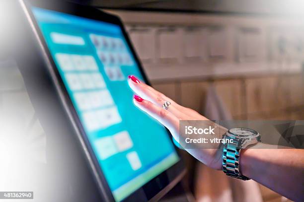 Bartender At The Point Of Sale Terminal Stock Photo - Download Image Now - Touch Screen, Cash Register, Retail