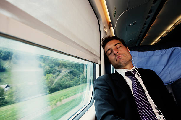 istock bussinesman  relaxing on the passenger train 481362962