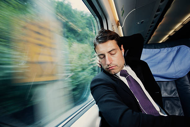 istock bussinesman  relaxing on the passenger train 481363086