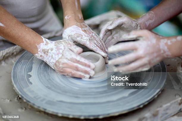 Two People Working With Clay Stock Photo - Download Image Now - 2015, Adult, Adults Only