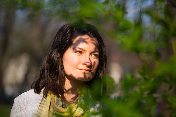 istock Young woman looking far away 481365668
